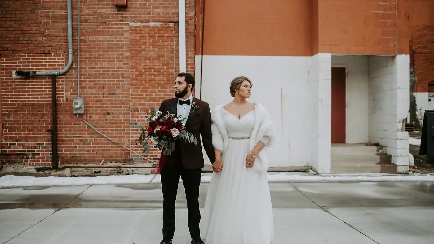 A bride in a gown from the Something Blue boutique at her Iowa wedding.