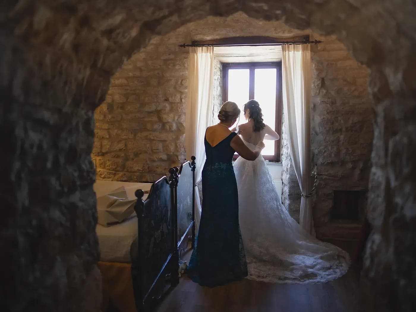 A mother of the bride in an occasion dress from the Something Blue boutique.