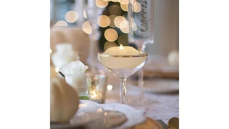 3" Floating LED Candle — available to rent from Something Blue