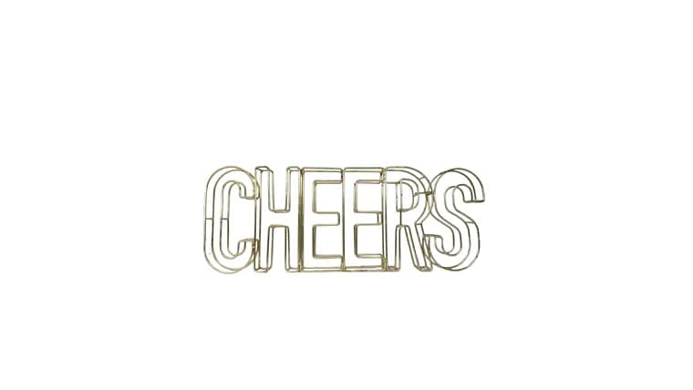 Gold Metal sign "CHEERS" — available to rent from Something Blue