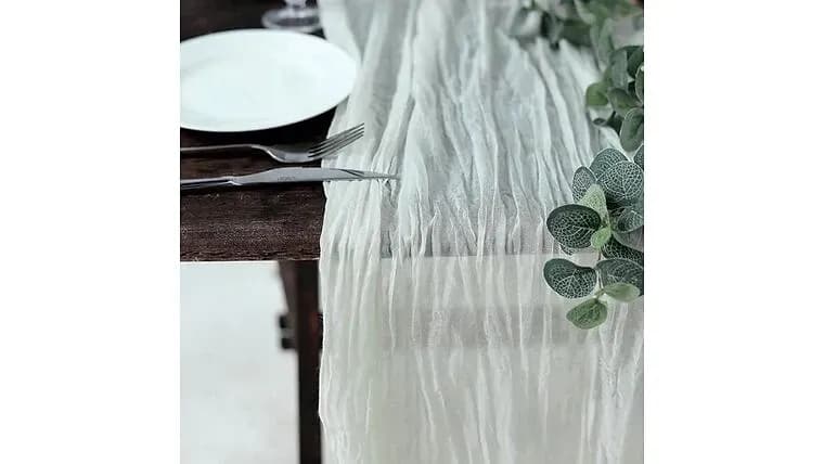 Ivory Cheesecloth Runner 12ft — available to rent from Something Blue
