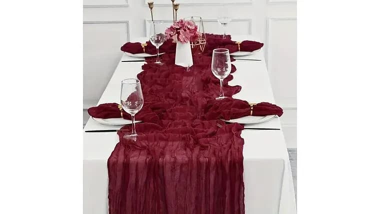 Maroon Cheesecloth — available to rent from Something Blue