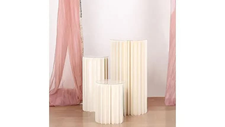 Round Accordion Tables — available to rent from Something Blue