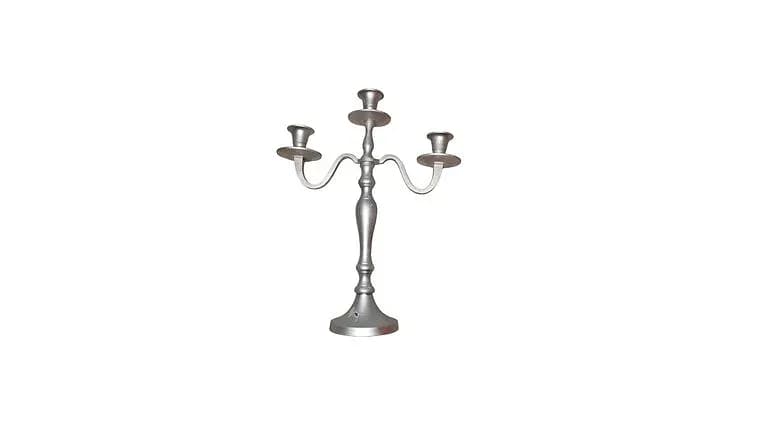 Silver Calabria candle holders — available to rent from Something Blue