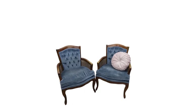 Vintage blue velvet chair with wood frame — available to rent from Something Blue