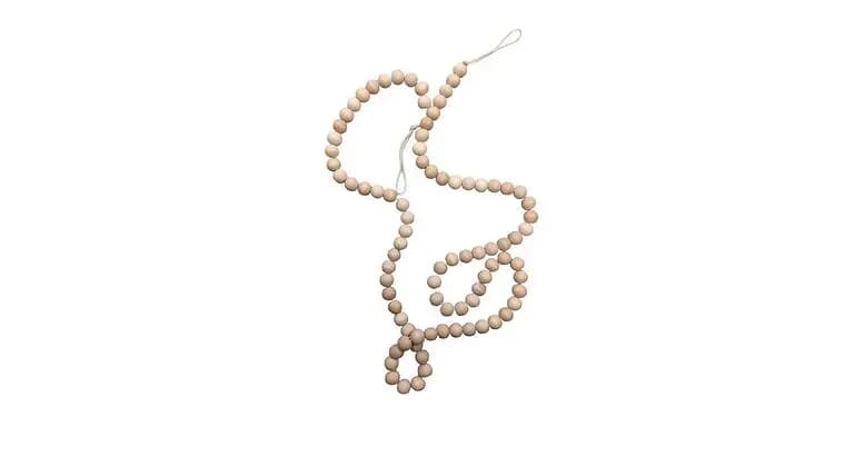 Wood Beaded Garland — available to rent from Something Blue